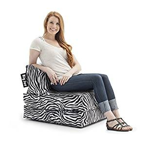 girl in tri fold chair